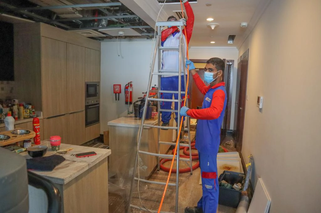 NADCA certified technician cleaning AC duct in Qatar