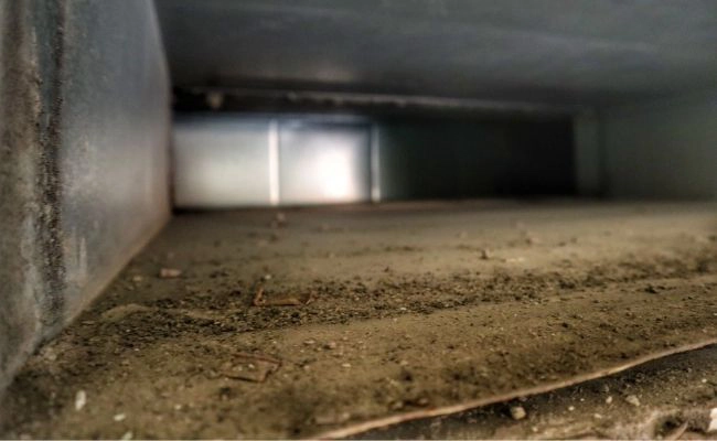 Cleaned duct sections after robotic HVAC cleaning service