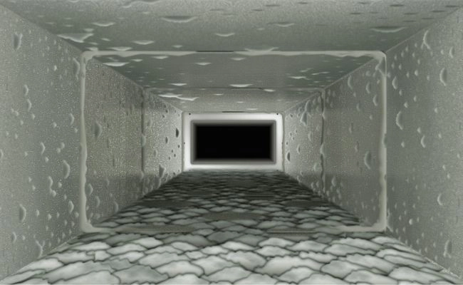 Dusty, dirt-covered air duct before professional cleaning in Qatar