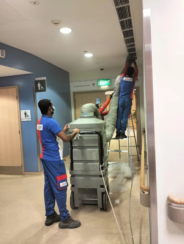 Emerald team cleaning HVAC ducts in a hospital in Qatar