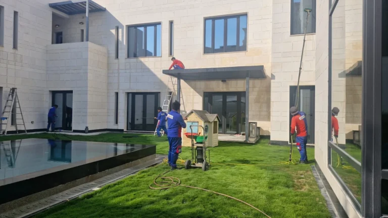 Emerald team cleaning villa windows and glass in Qatar